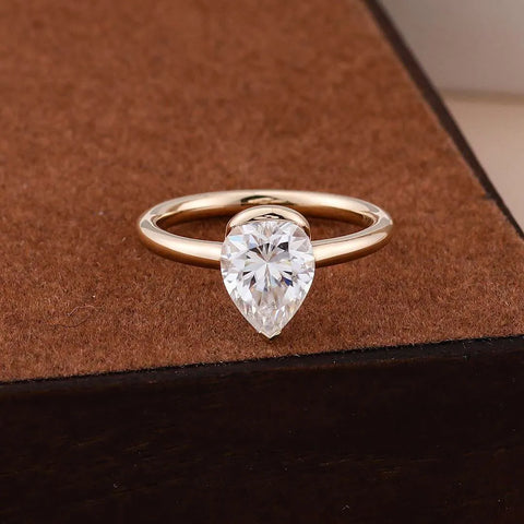 The Lumière Pear Half-Bezel Ring