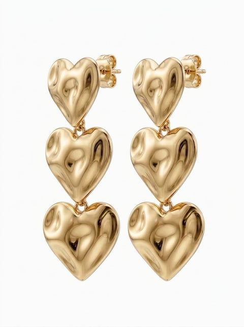 A pair of gold heart drop waterproof earrings with a textured, puffy 3D heart design, shown against a plain white background.