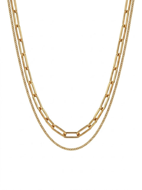 A double-layered gold chain necklace featuring a thick paperclip link top layer and a fine cable link bottom layer, displayed against a solid white background.