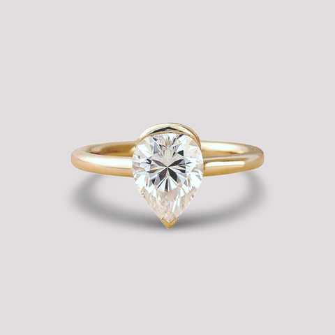 The Lumière Pear Half-Bezel Ring