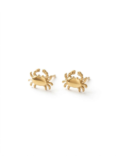 A pair of gold crab stud earrings on a clean white background.