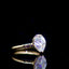 The Lumière Pear Half-Bezel Ring